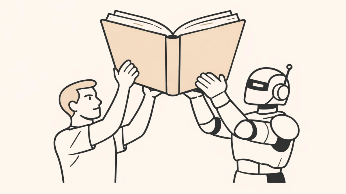 A human and a robot holding up a book