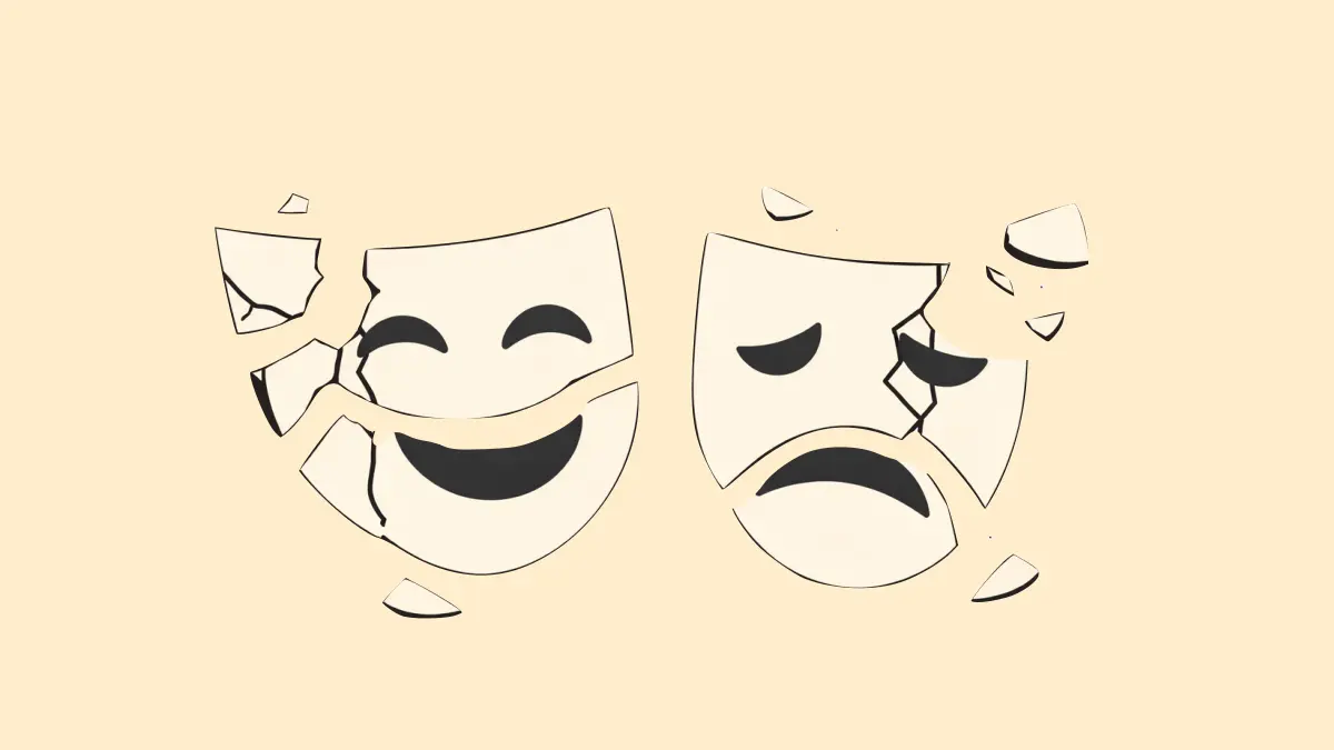 Two theatre masks in pieces on the ground