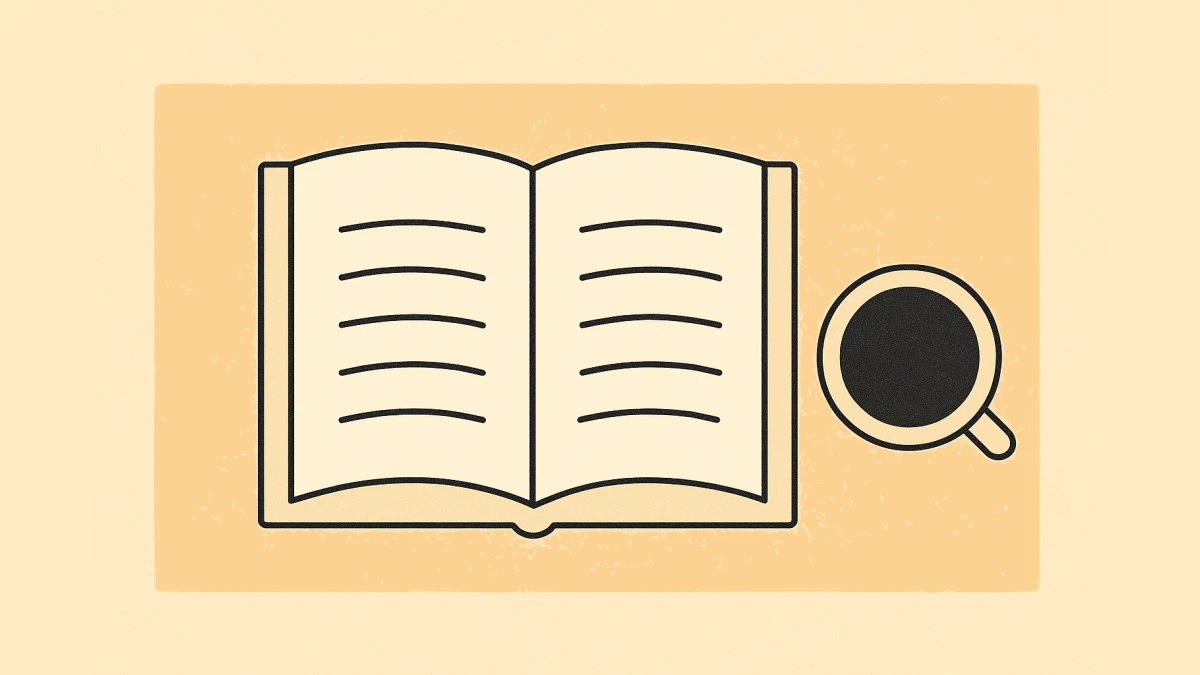 An open book and cup of coffee on a desk.